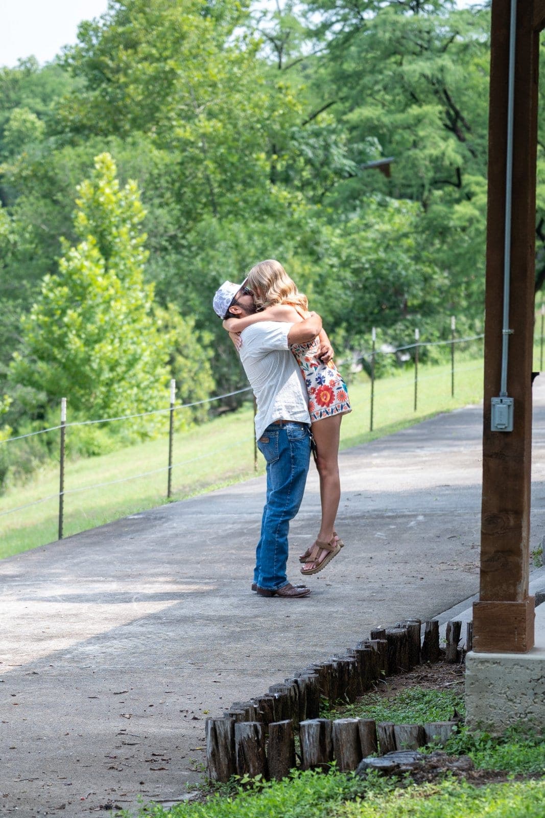 Couple embracing after a surprise marriage proposal in Austin, Texas, photographed by Zan Visuals.